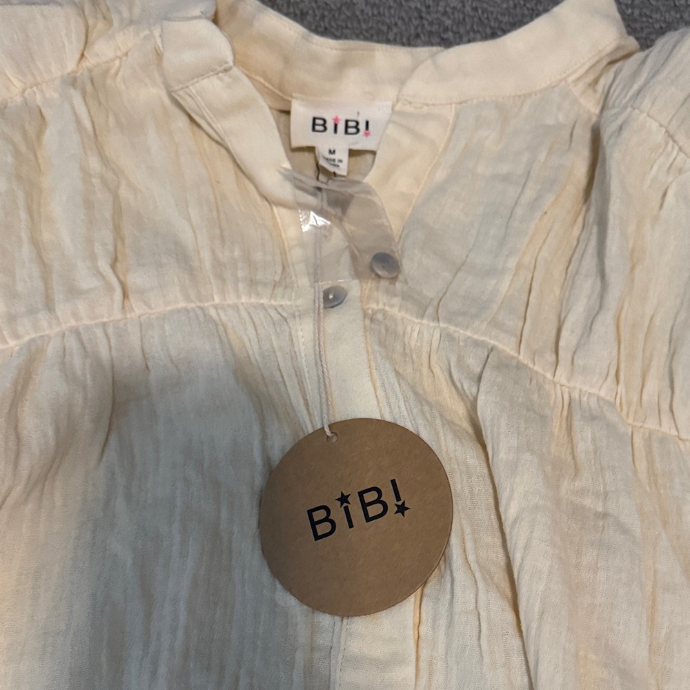 BiBi Light Cream Ruffle Top - Picture 2 of 3